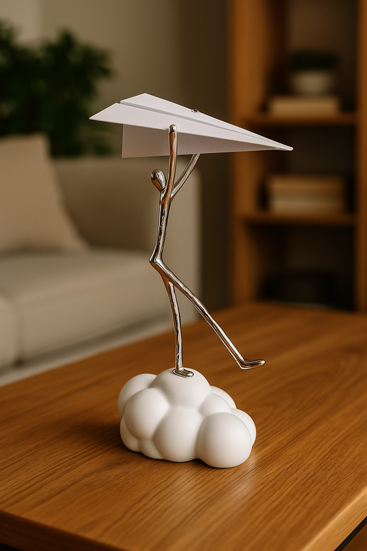 ESCULTURA MENINO E O AVIÃO - 27X18X44