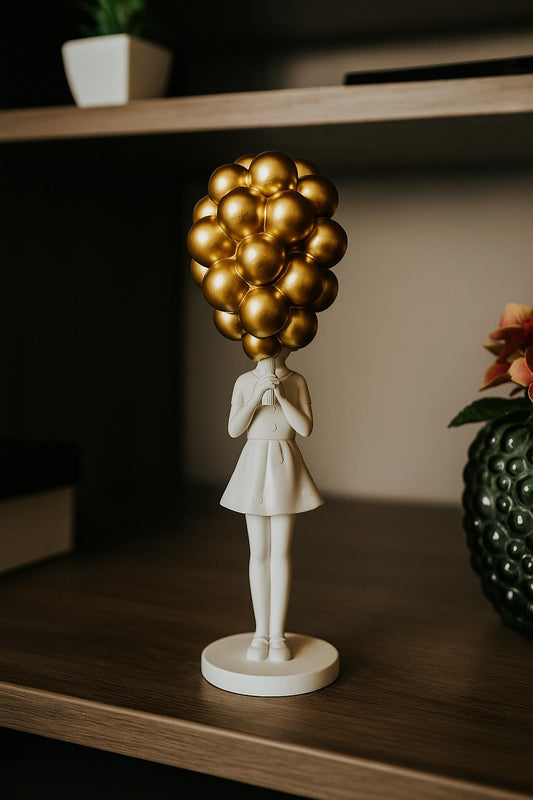ESCULTURA MENINA COM BALÃO DOURADO - 32cm